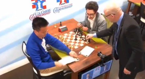 Chess grandmaster angrily punches female videographer after he lost to opponent