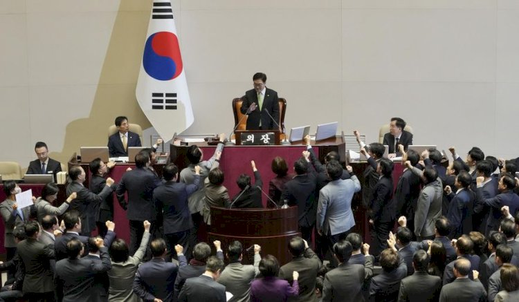 South Korean lawmakers impeach Acting President Han Duck-Soo